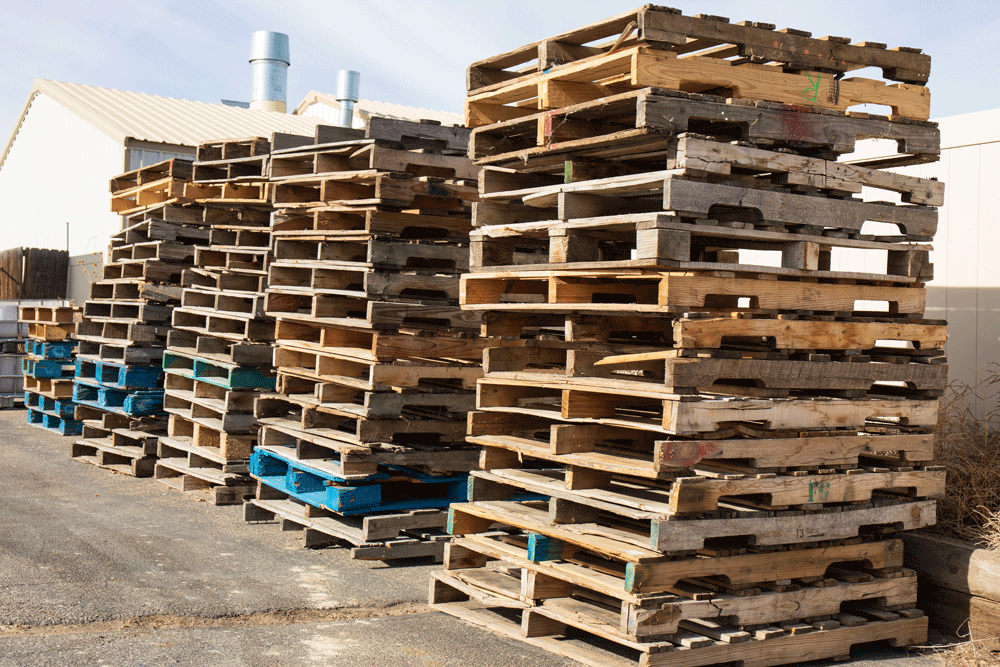 a stack of wooden pallets