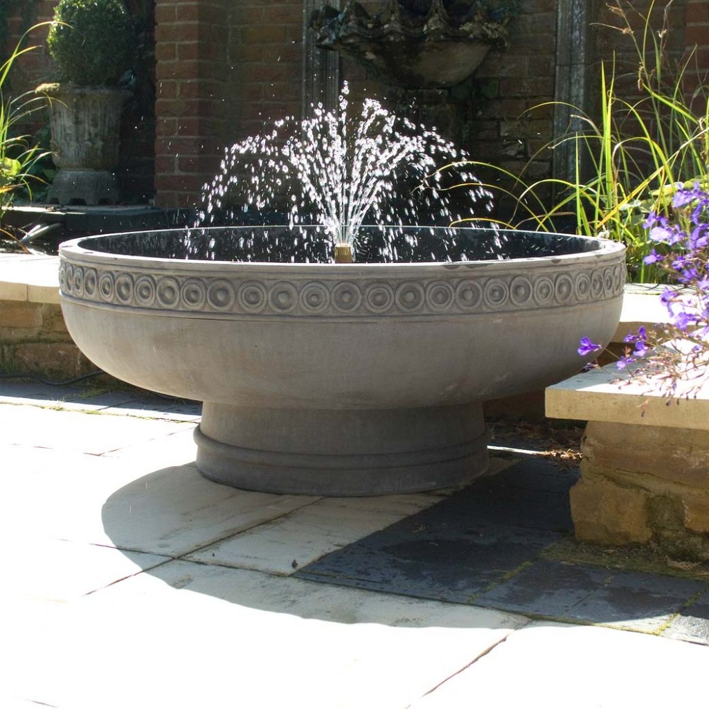 how to clean a cast stone fountain